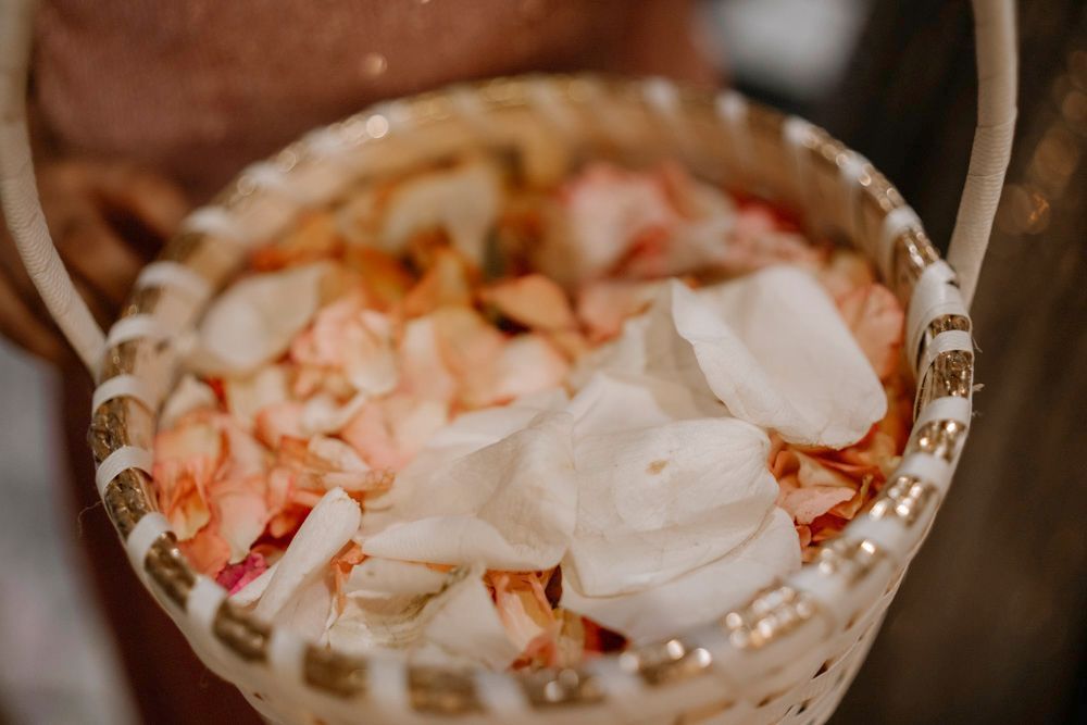 Detail of a basket filled with pink and white rose petals, Sheraz & Nawal's wedding at Nishat Hotel, Lahore