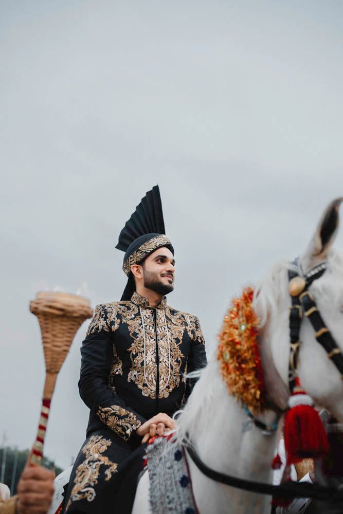 Close-up of the groom on horseback during the baraat procession, Zara & Shuaib's wedding, Lahore